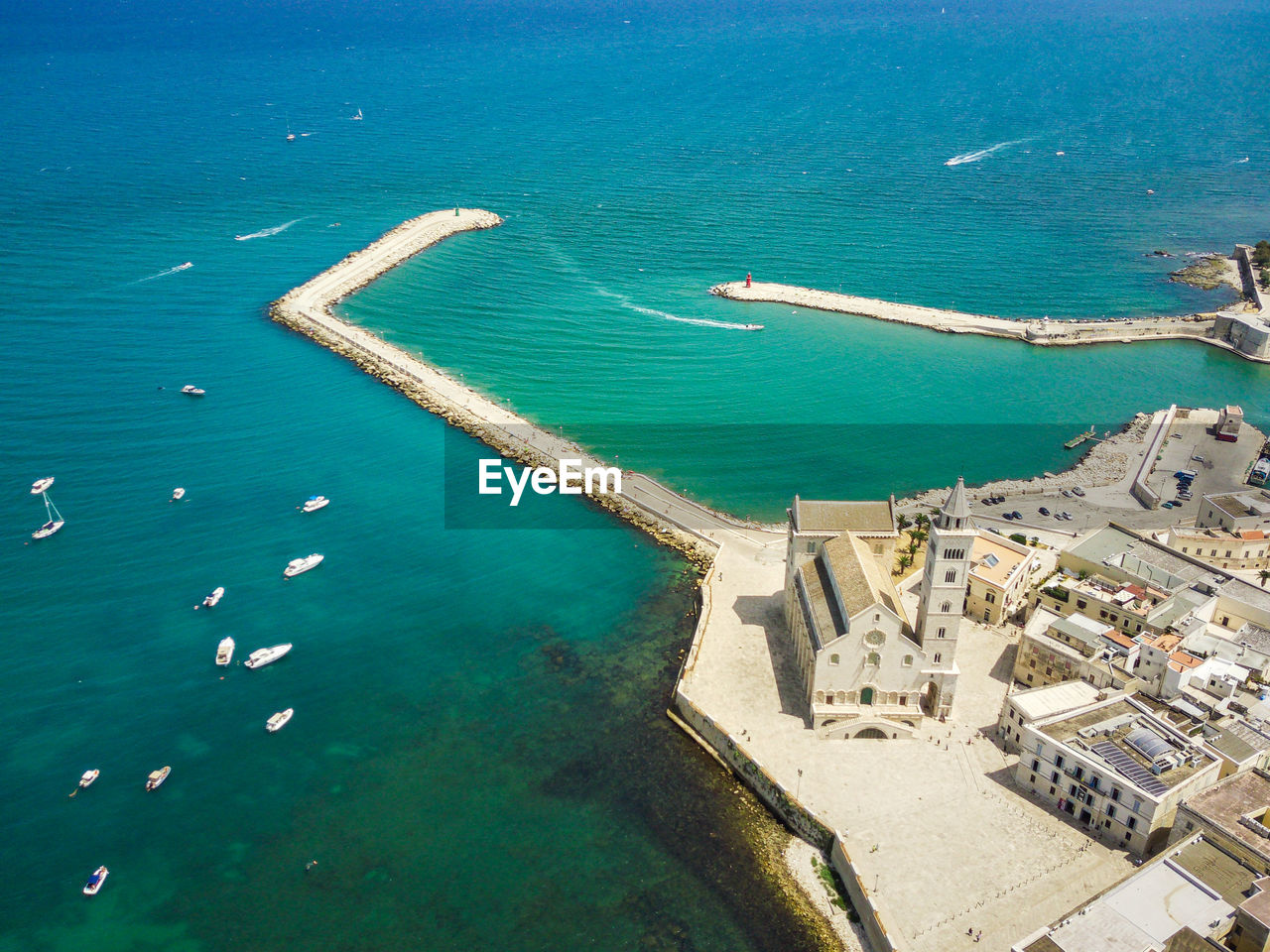 HIGH ANGLE VIEW OF SWIMMING POOL AT SEASIDE