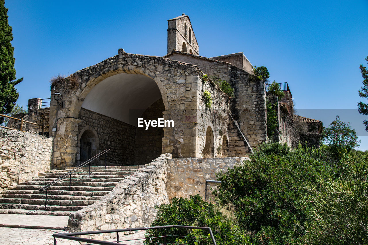 Low angle view of old building against sky