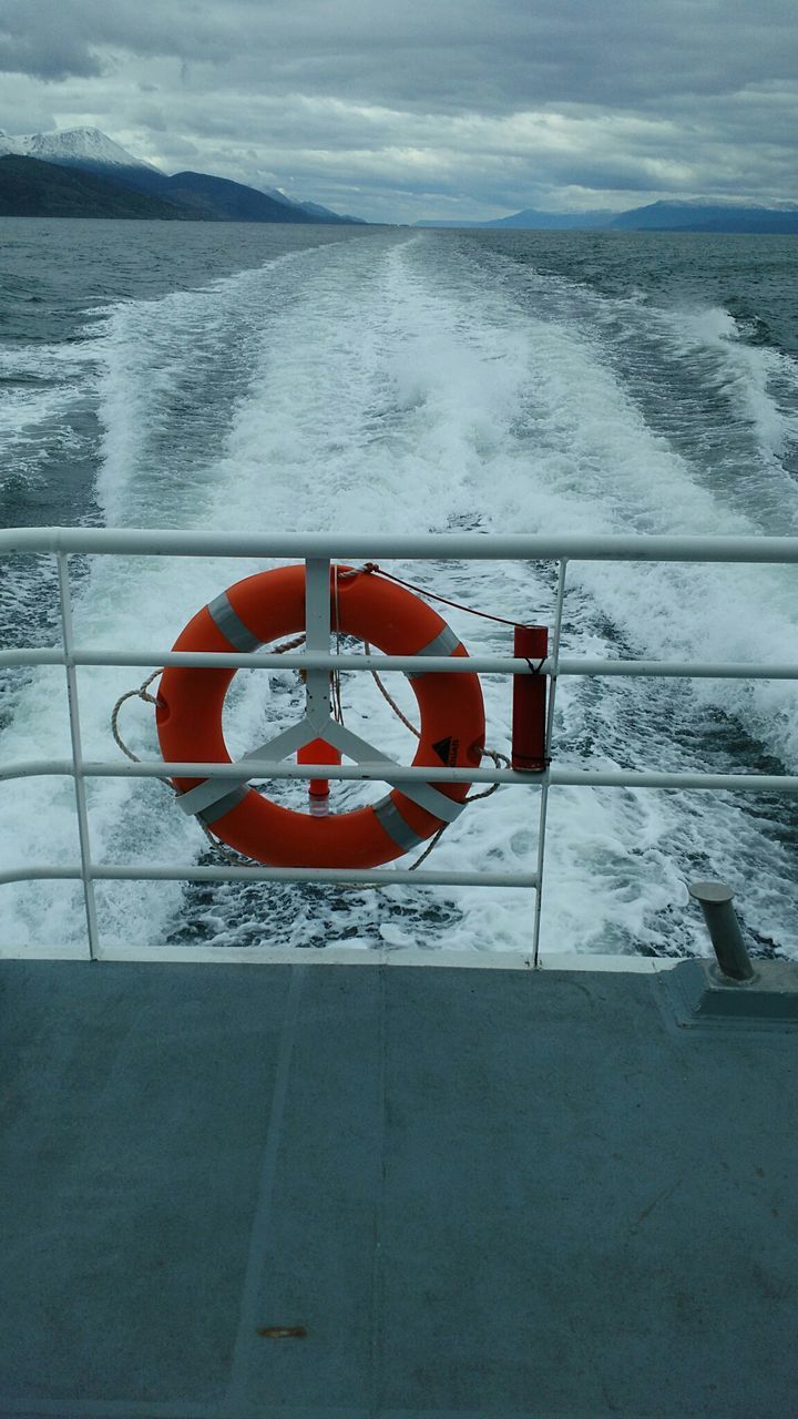 Life belt hanging on boat at sea