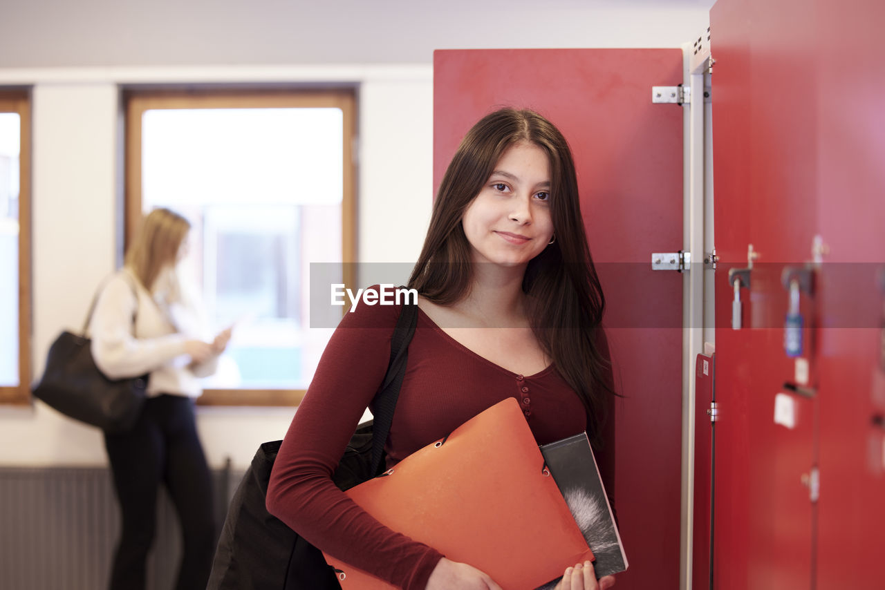 Teenage girl looking at camera