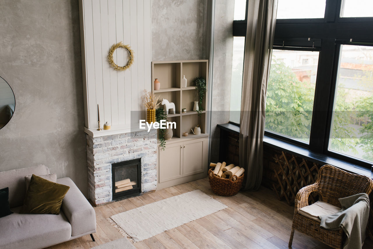 Interior of the living room with fireplace of a scandinavian-style country house