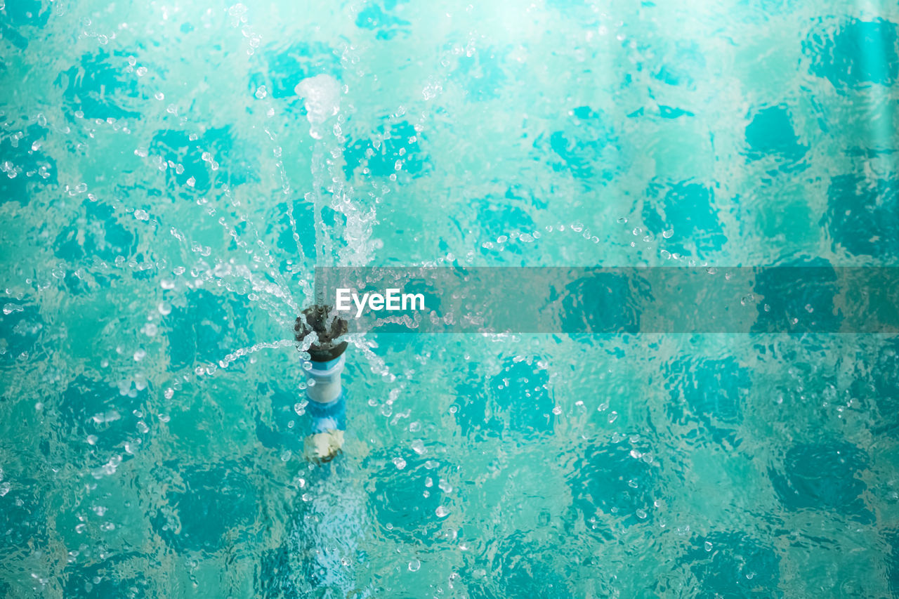 High angle view of fountain splashing water