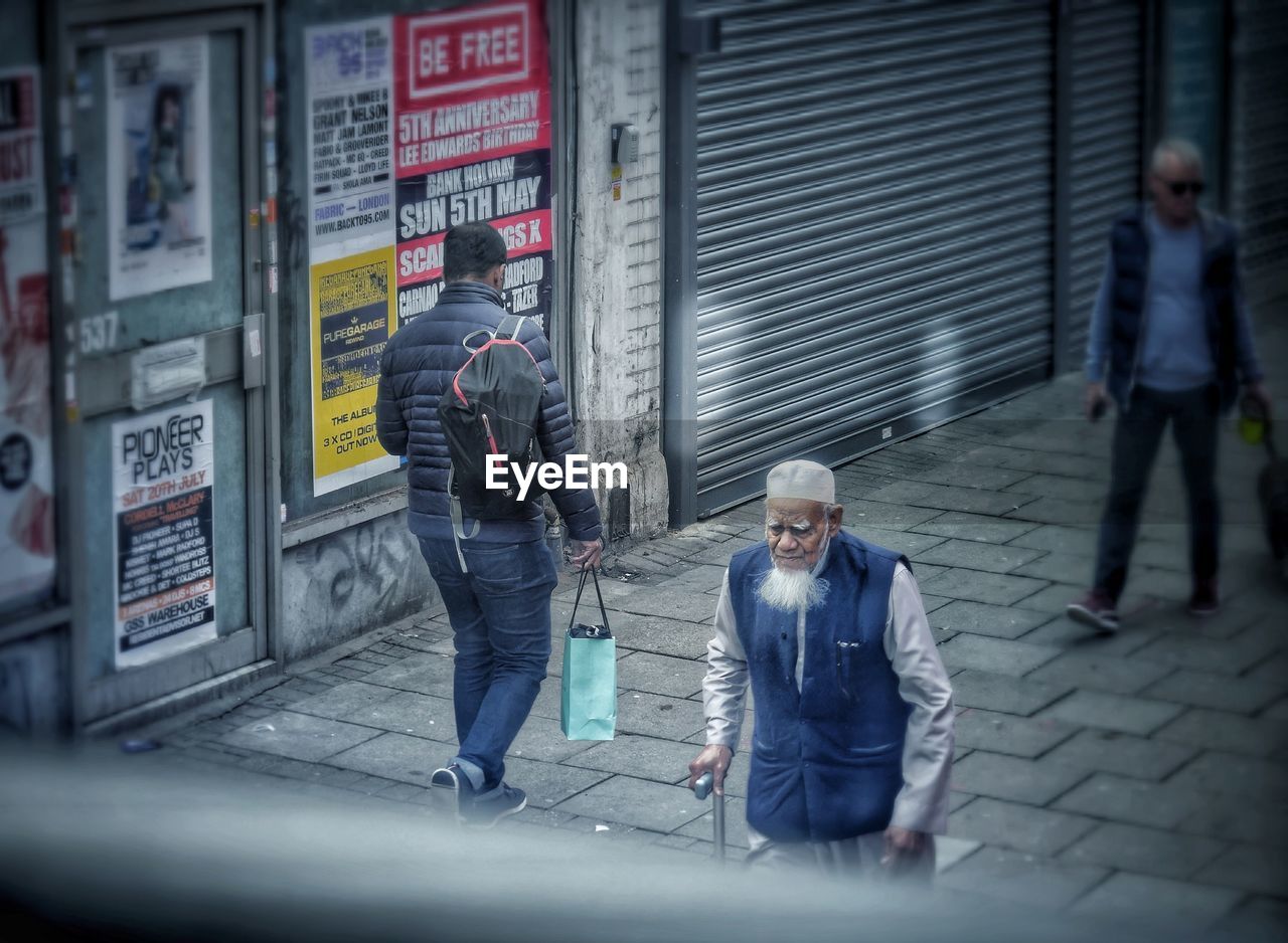 PEOPLE WALKING ON STREET