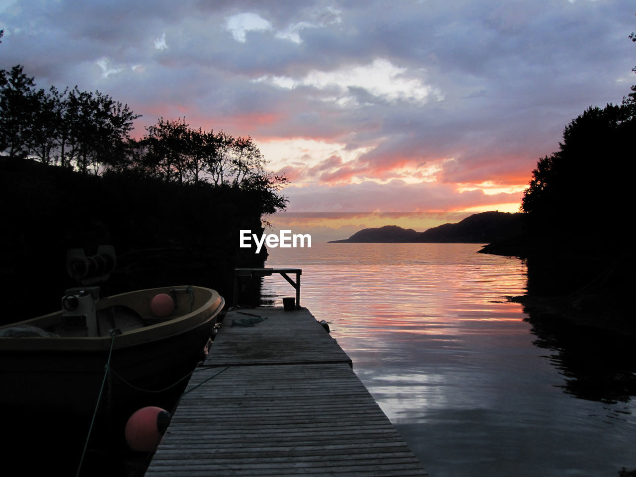 VIEW OF JETTY AT SUNSET