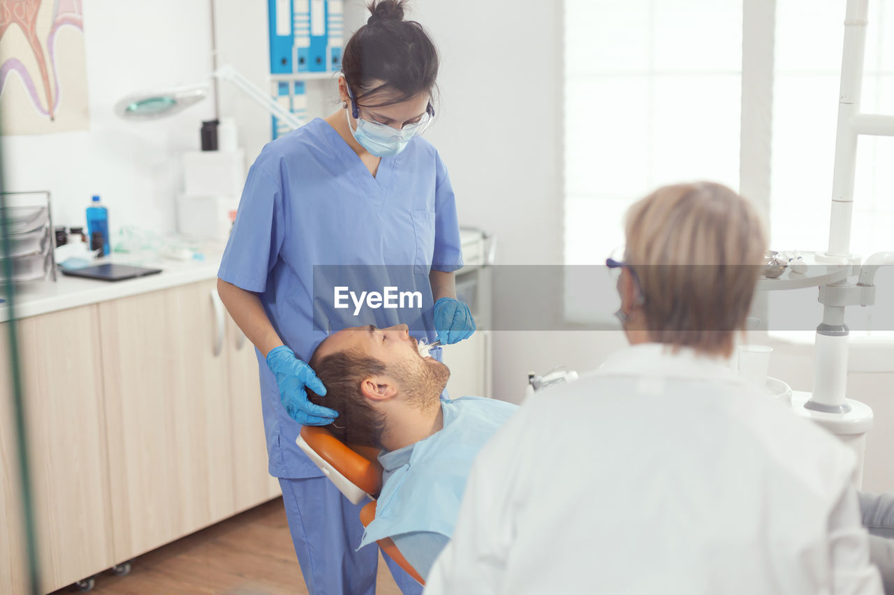 Man lying at dentist office