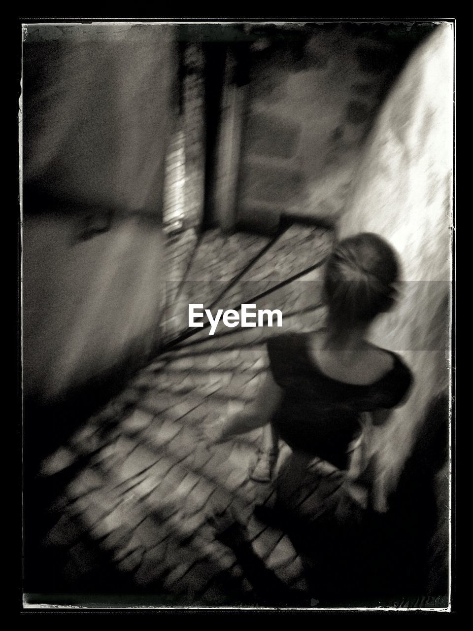 WOMAN LOOKING AT CAMERA