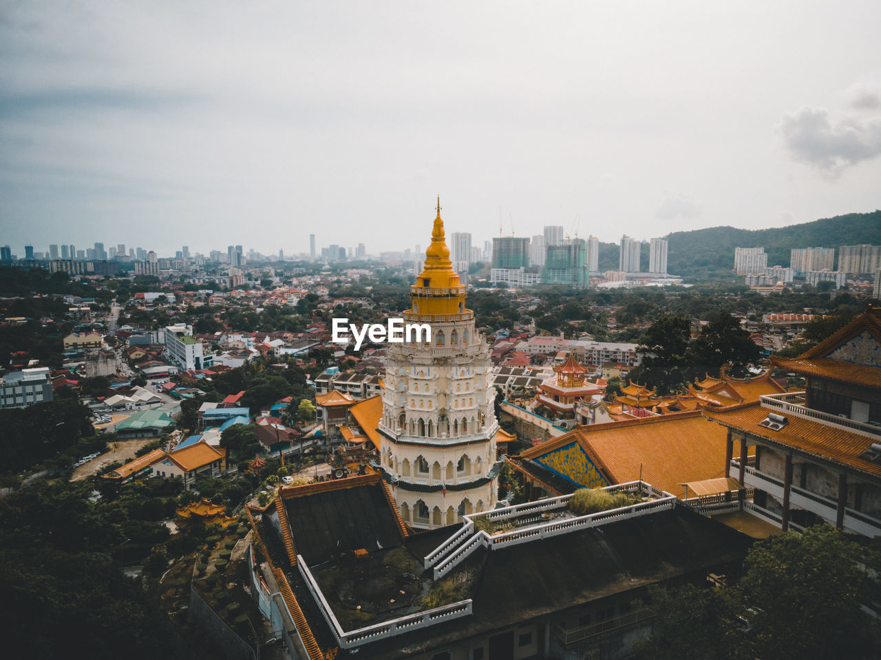 high angle view of buildings in city against sky