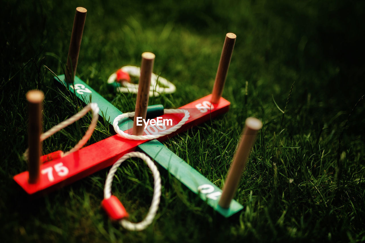 HIGH ANGLE VIEW OF EQUIPMENT ON GRASS