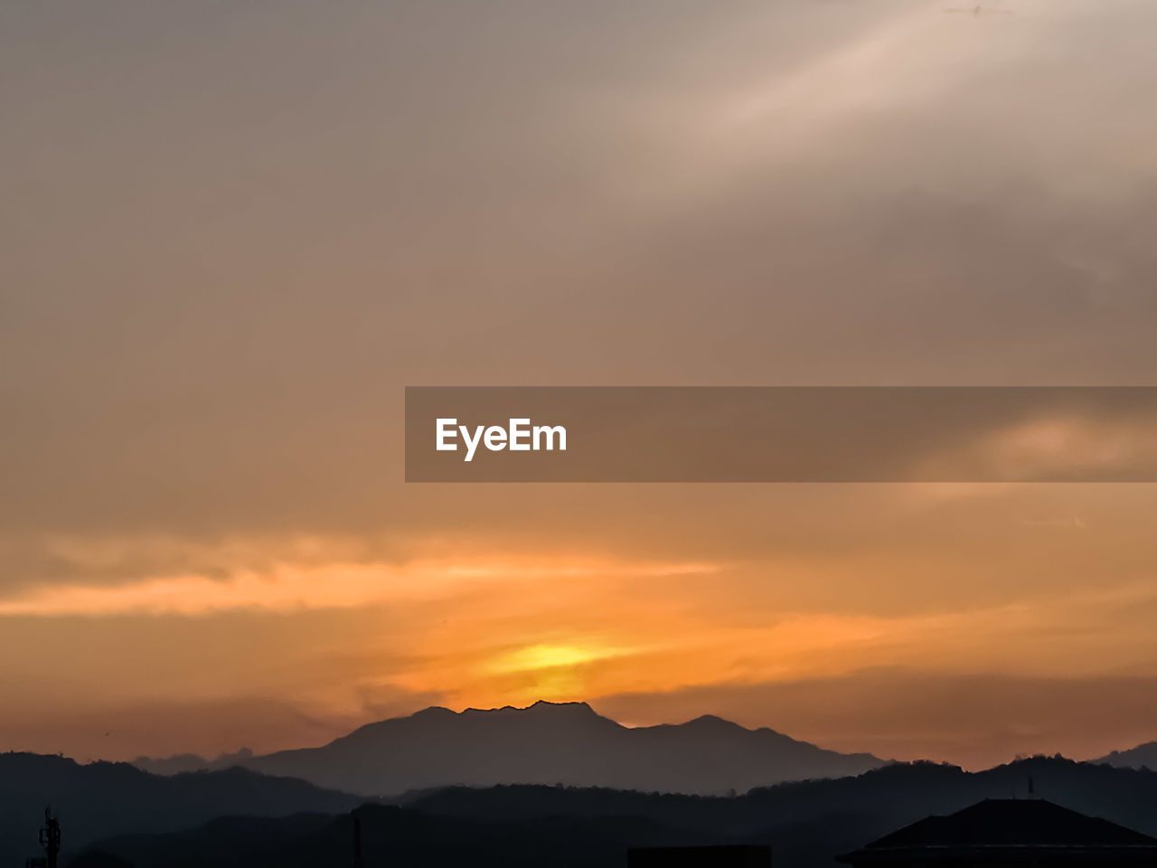 View of the sky and mountains at sunset