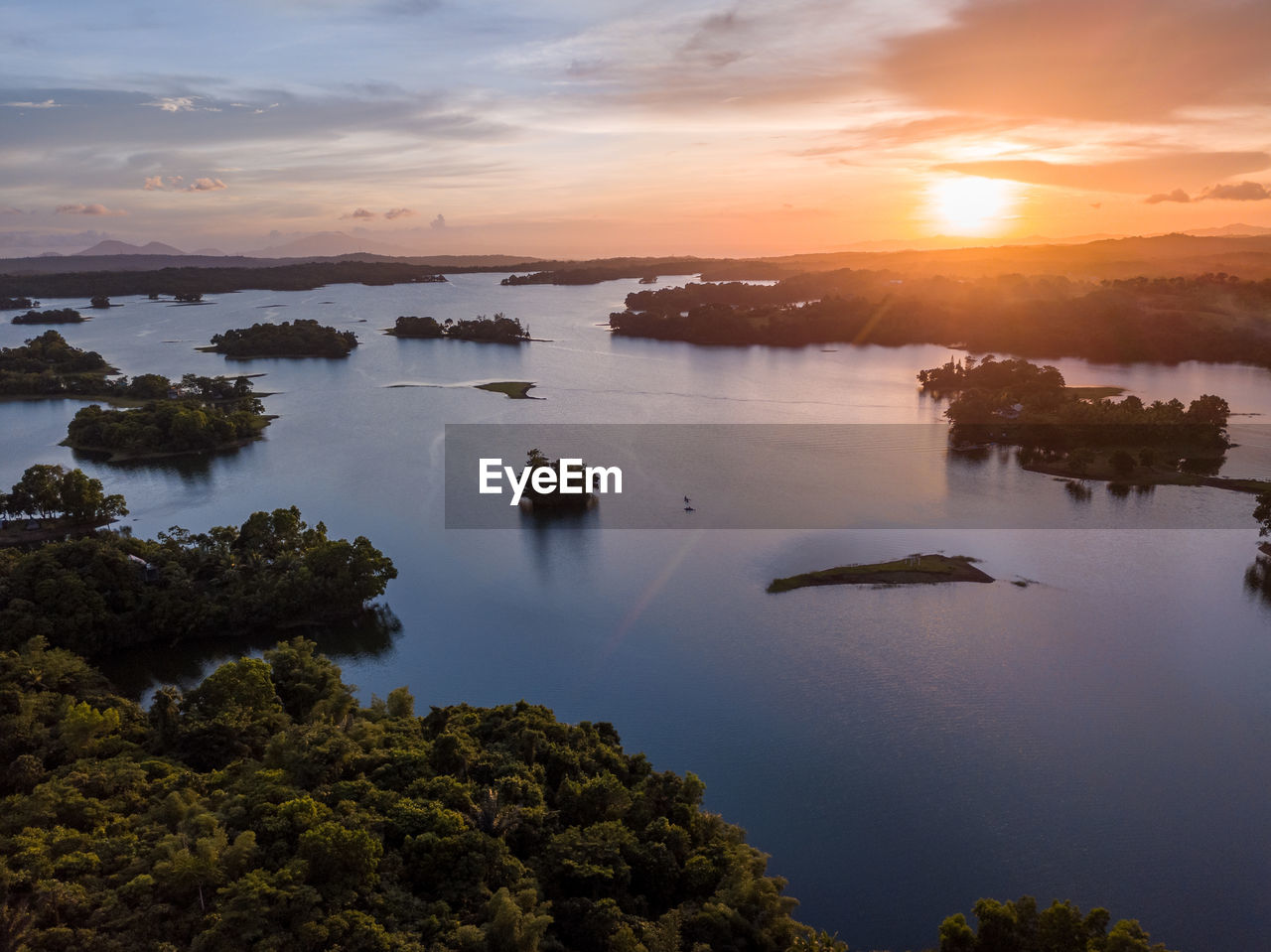 Aerial panorama drone picture of islands in the lumot lake caliraya, cavinti, philippines at sunset