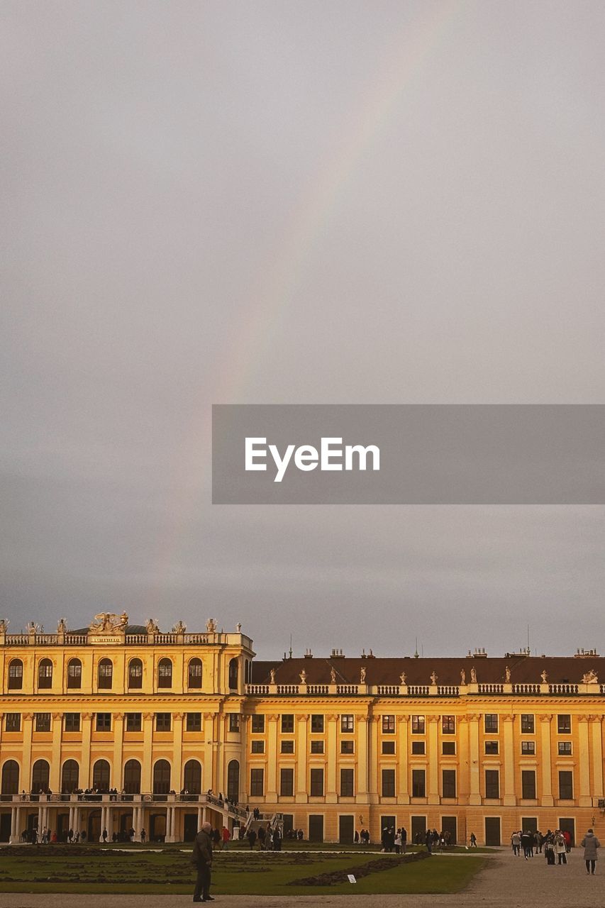 rainbow, architecture, building exterior, built structure, sky, nature, city, building, cloud, multi colored, travel destinations, beauty in nature, environment, outdoors, tourism, the past, history, day, travel, evening, scenics - nature