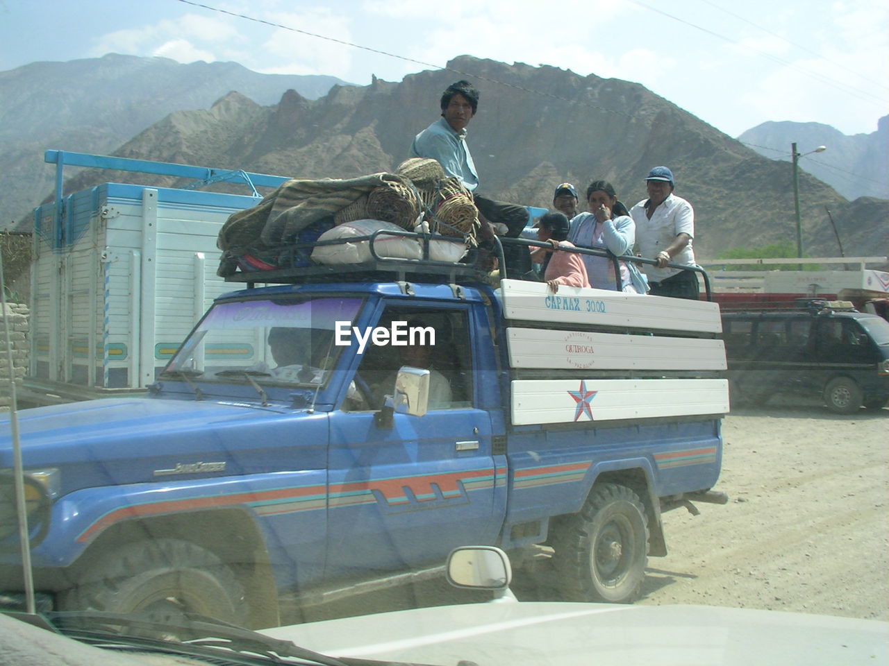 PEOPLE SITTING IN BUS