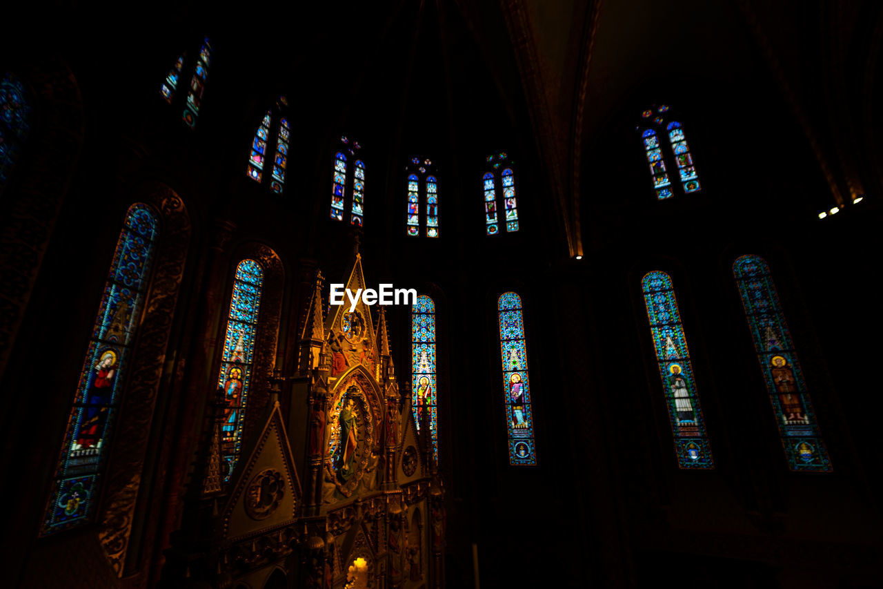 Low angle view of illuminated ceiling