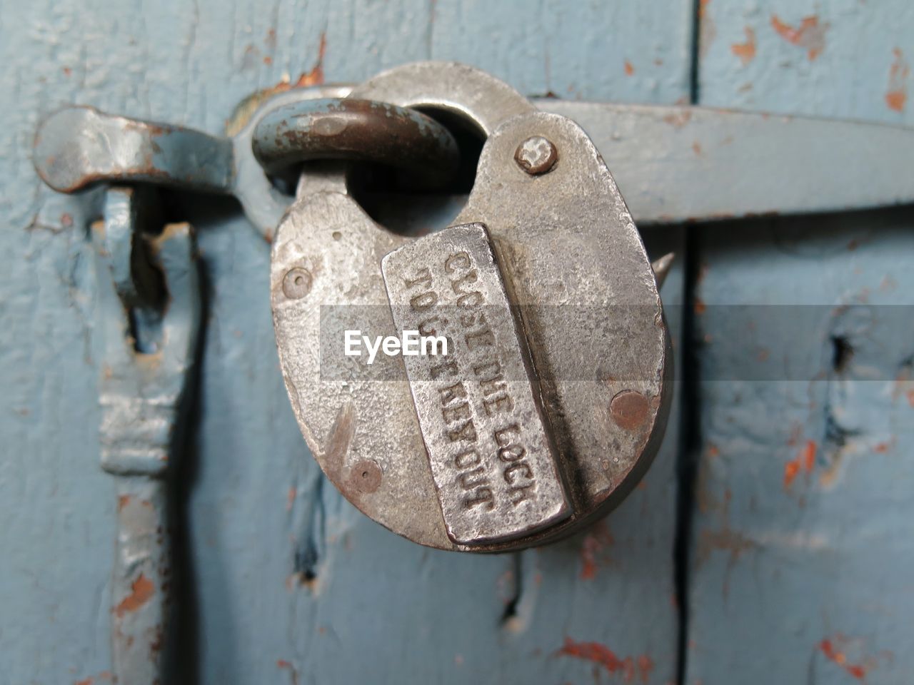 Close-up of padlock on door