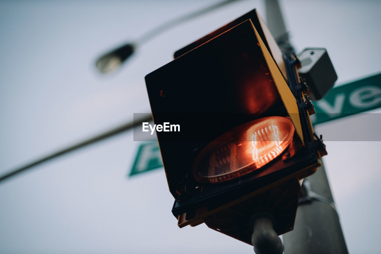 Looking up at traffic light timer.