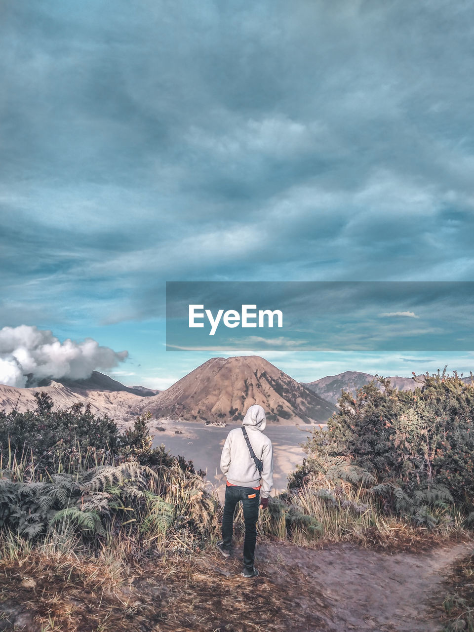 Rear view of man standing at bromo-tengger-semeru national park