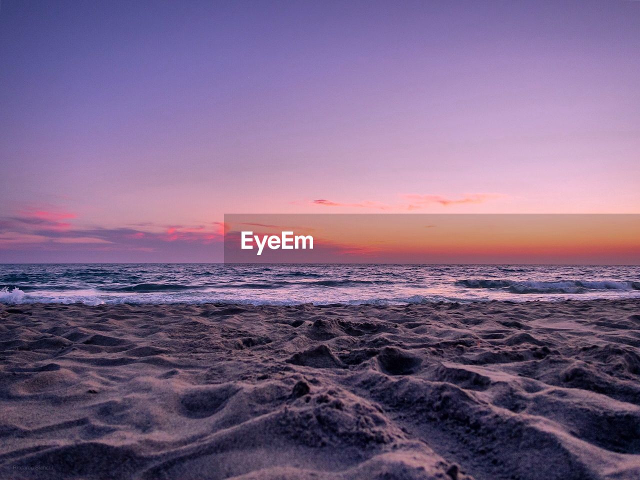 Scenic view of sea against sky during sunset