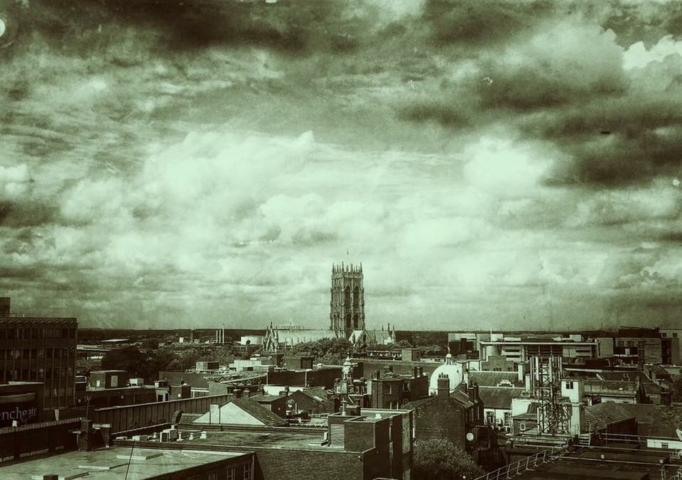 CLOUDY SKY OVER CITY