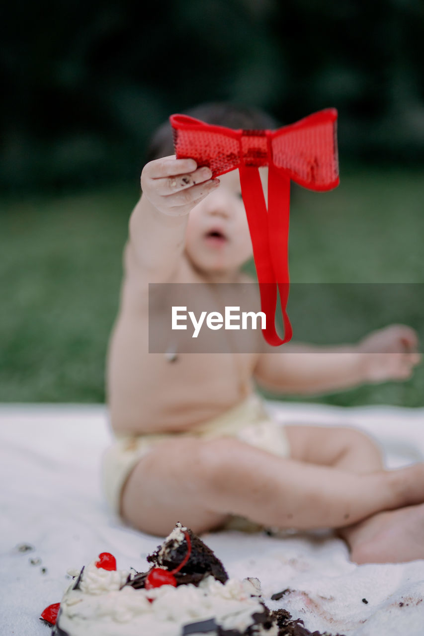 Baby girl with ribbon