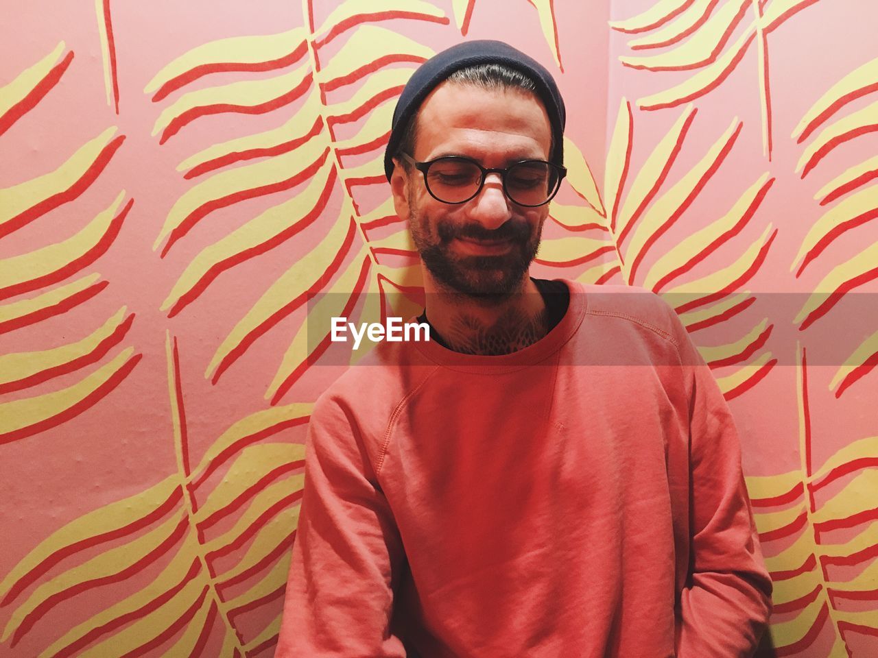 Portrait of man wearing eyeglasses and standing outdoors