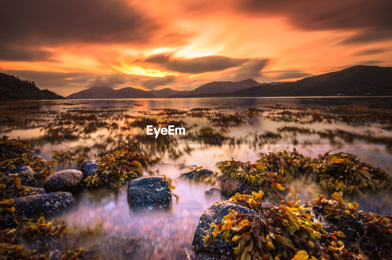 Sunset on a lake in the scottish highlands