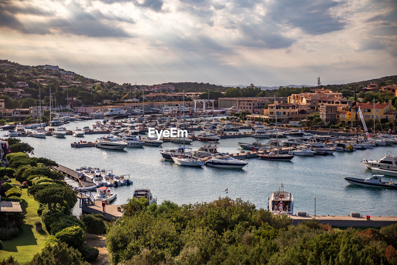 Boats moored at harbor