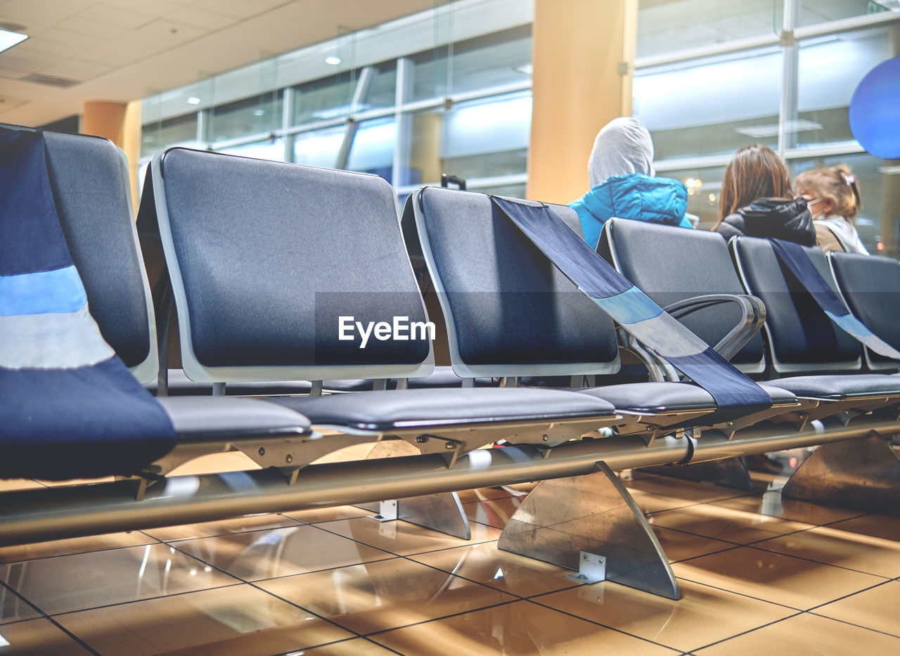 Empty airport with blurred plane on a background