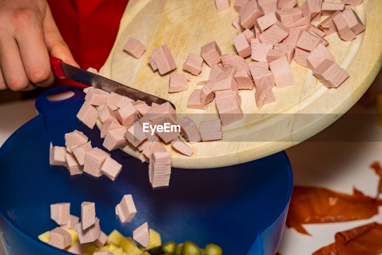 High angle view of person preparing food on table