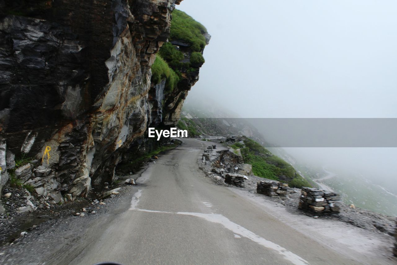 ROAD LEADING TOWARDS CLIFF