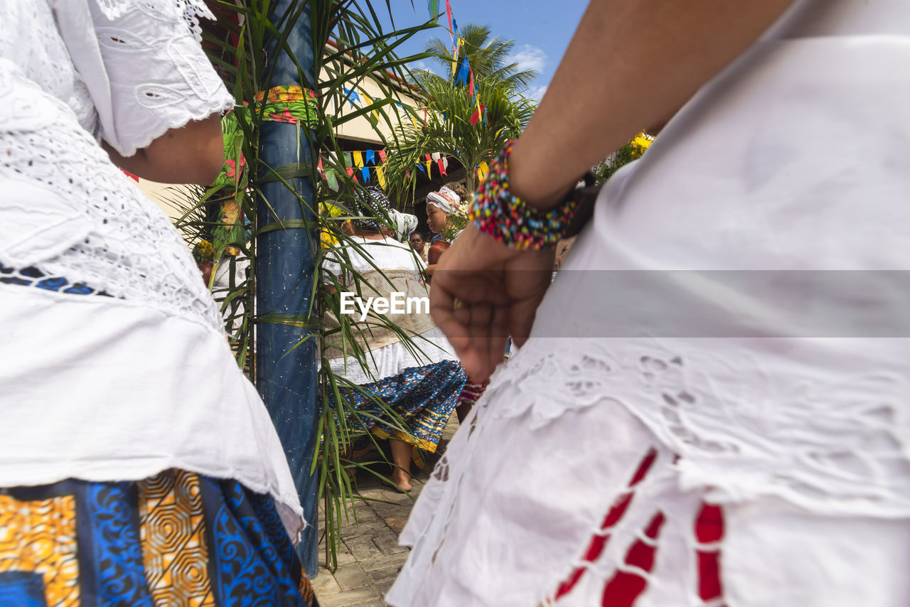 Members of the candomble religion gathered in traditional clothing 