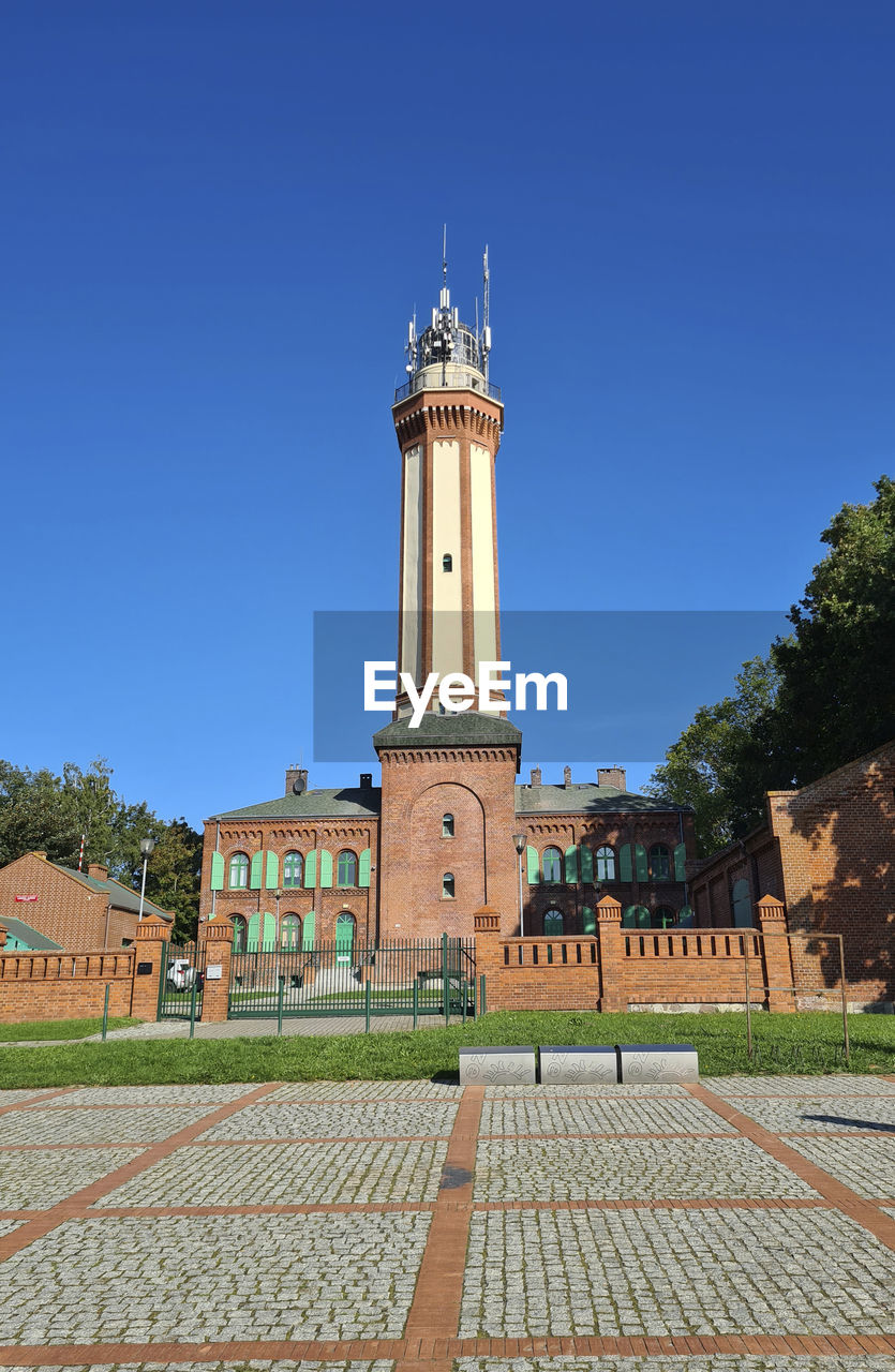 architecture, built structure, building exterior, sky, landmark, building, blue, tower, travel destinations, clear sky, history, the past, nature, travel, day, sunny, no people, religion, place of worship, outdoors, tourism, plant, city, tree, belief