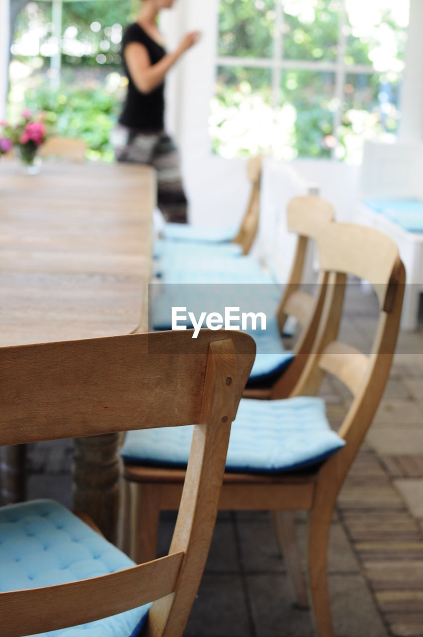 Empty chairs and table in restaurant