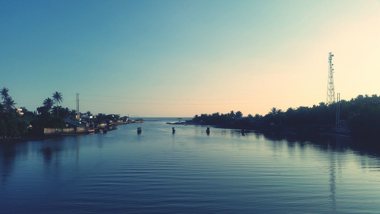 View of calm sea at sunset