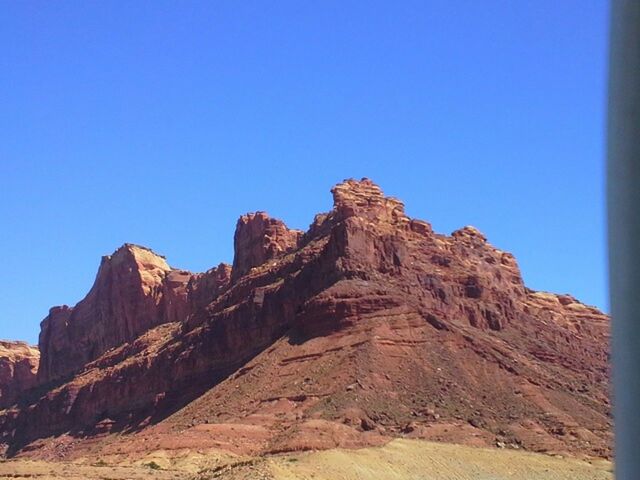 SCENIC VIEW OF MOUNTAINS AGAINST CLEAR SKY