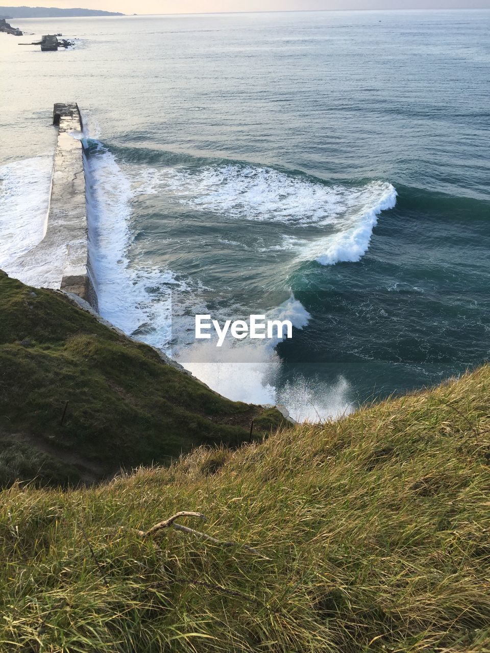 High angle view of waves on beach