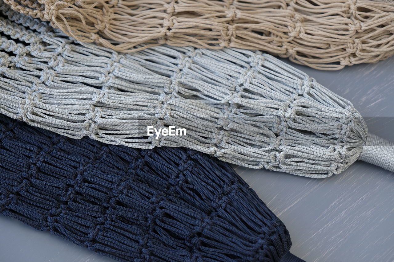 High angle view of knitted ropes on table