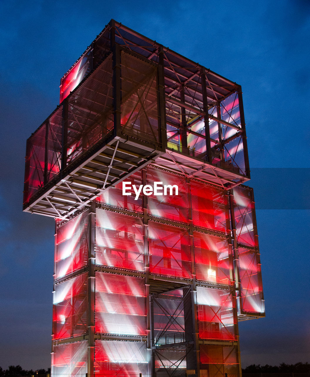 LOW ANGLE VIEW OF RED BUILDING AGAINST SKY