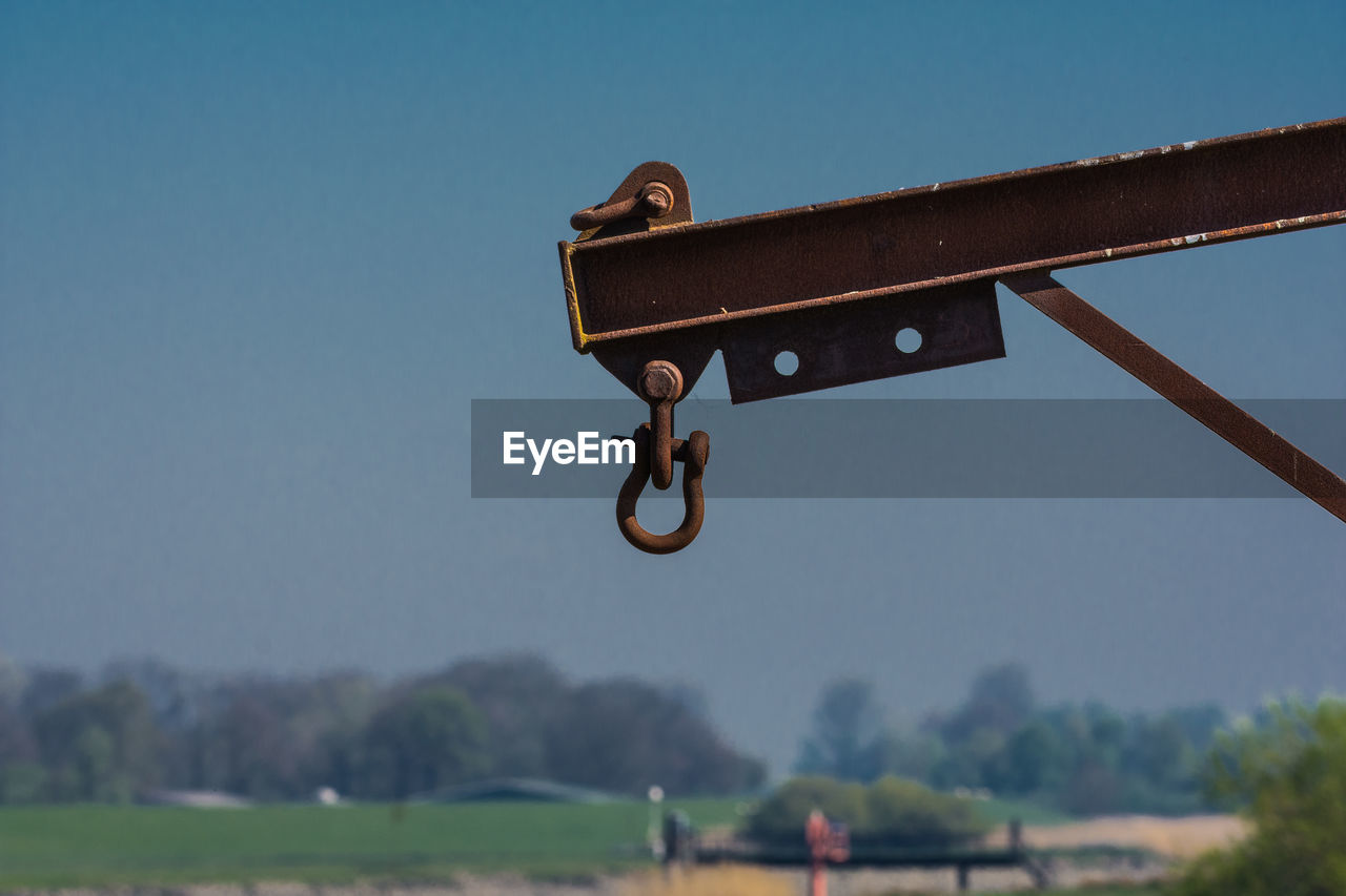 Low angle view of metal structure against sky