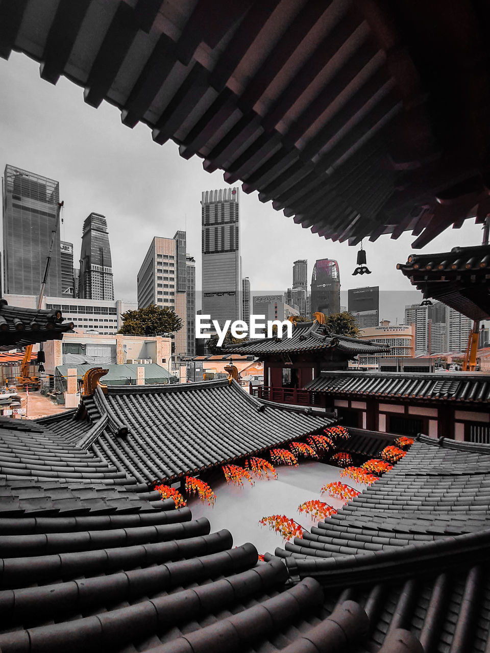 HIGH ANGLE VIEW OF BUILDINGS AGAINST SKY