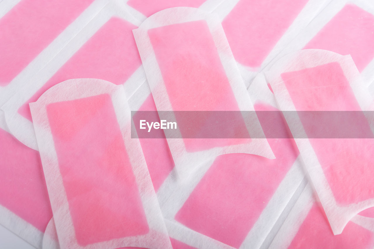 FULL FRAME SHOT OF PAPER WITH PINK PATTERN