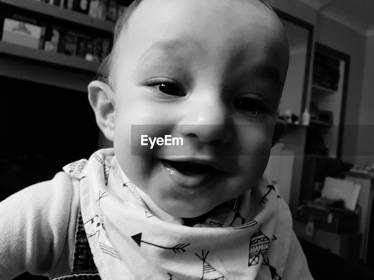 Close-up portrait of baby at home