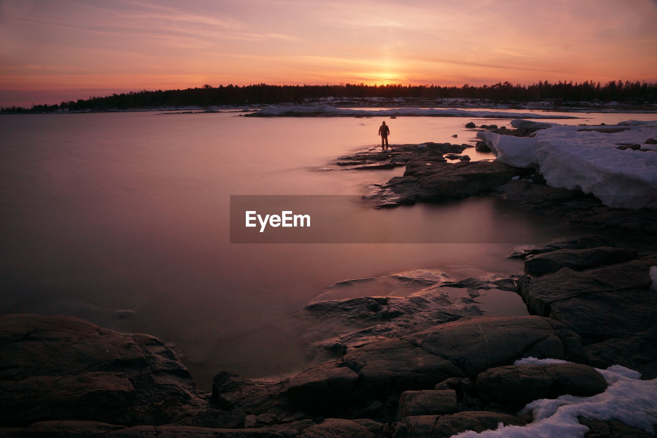 Scenic view of sea against sky during sunset