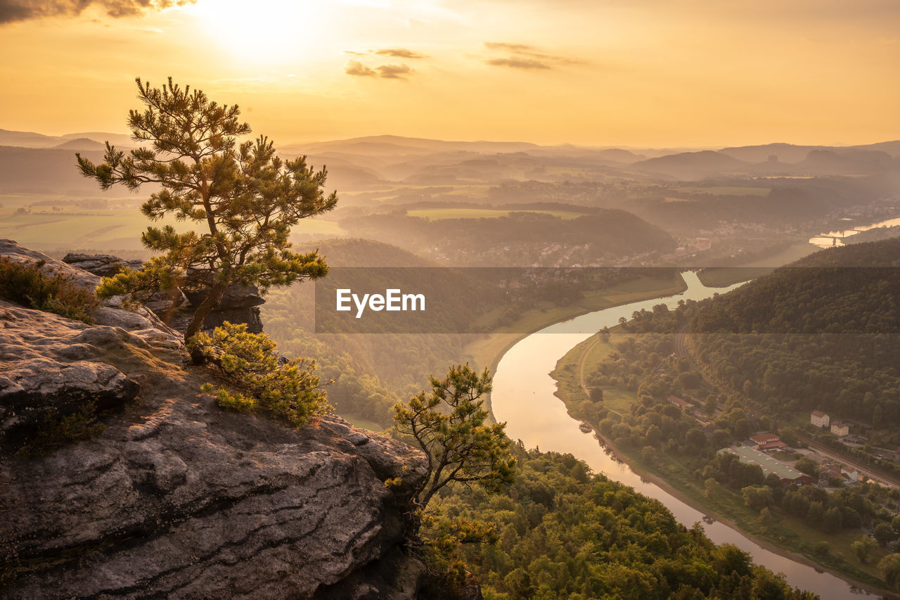 Scenic view of mountains against sky during sunset