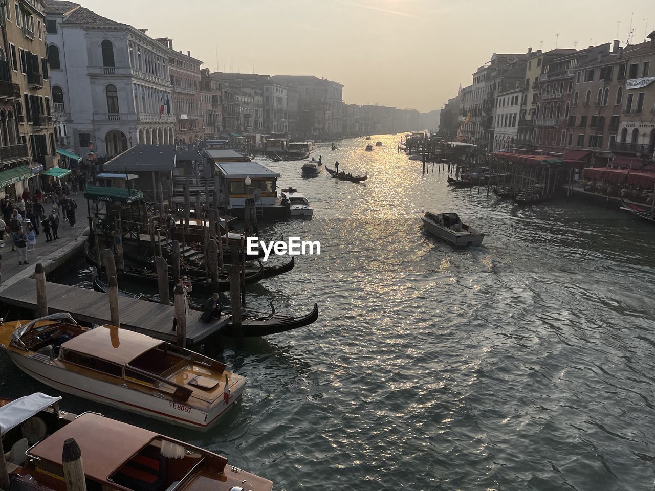 HIGH ANGLE VIEW OF BUILDINGS BY SEA