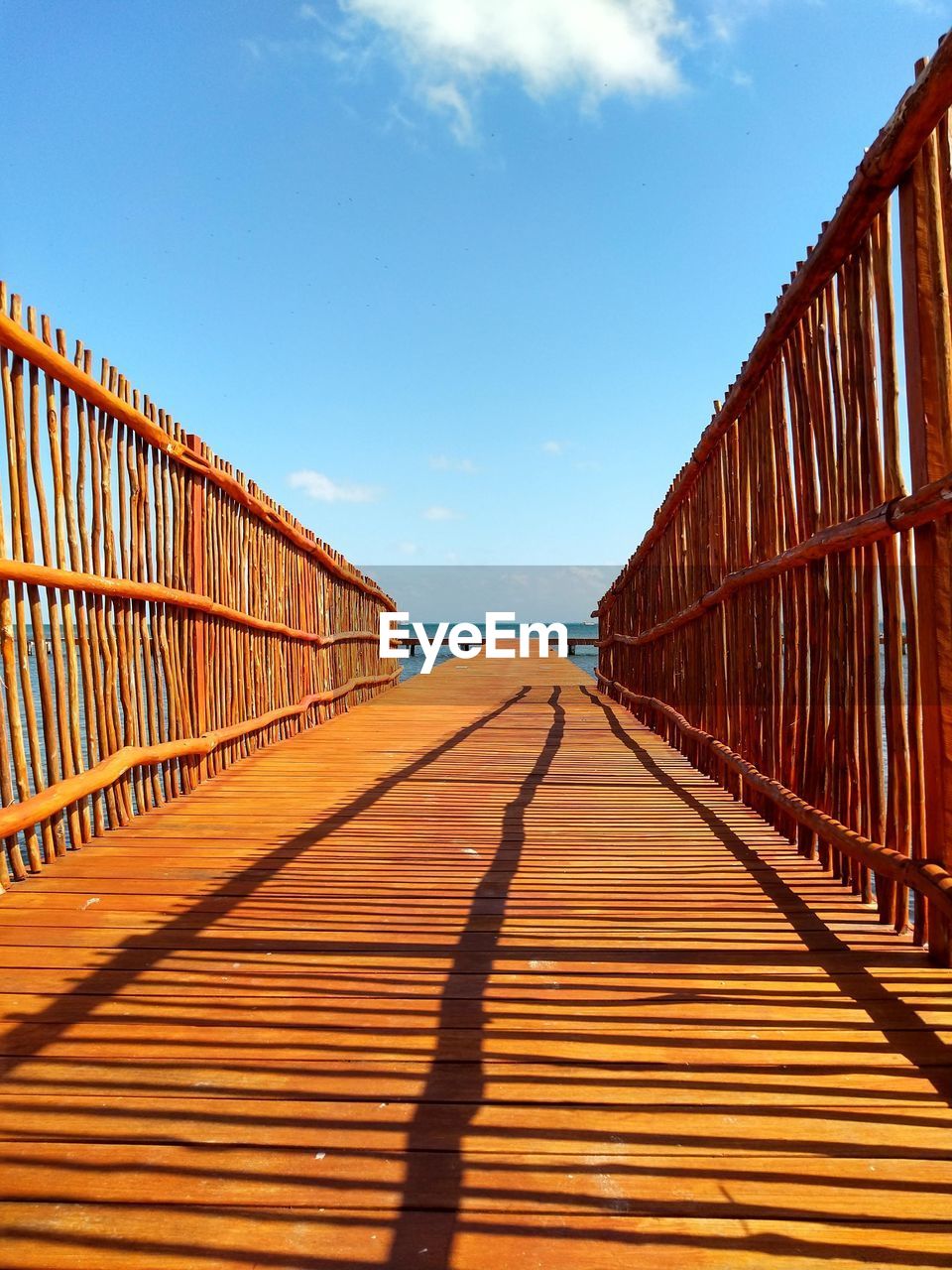 SURFACE LEVEL OF FOOTBRIDGE AGAINST FOOTPATH