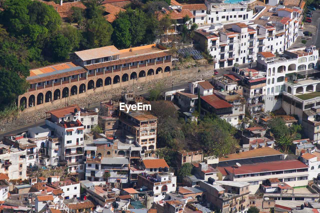 High angle view of buildings in town on taxco