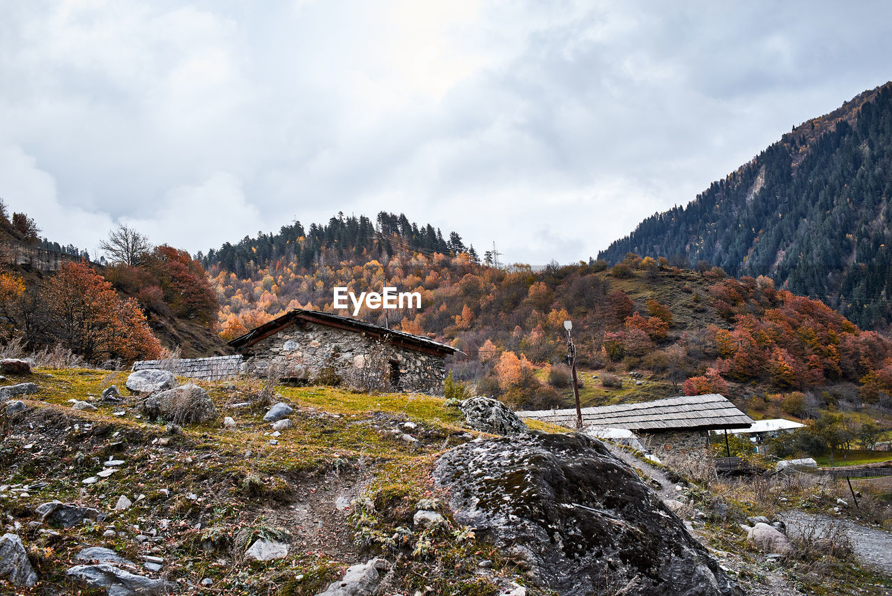 Scenic view of mountains against sky during autumn