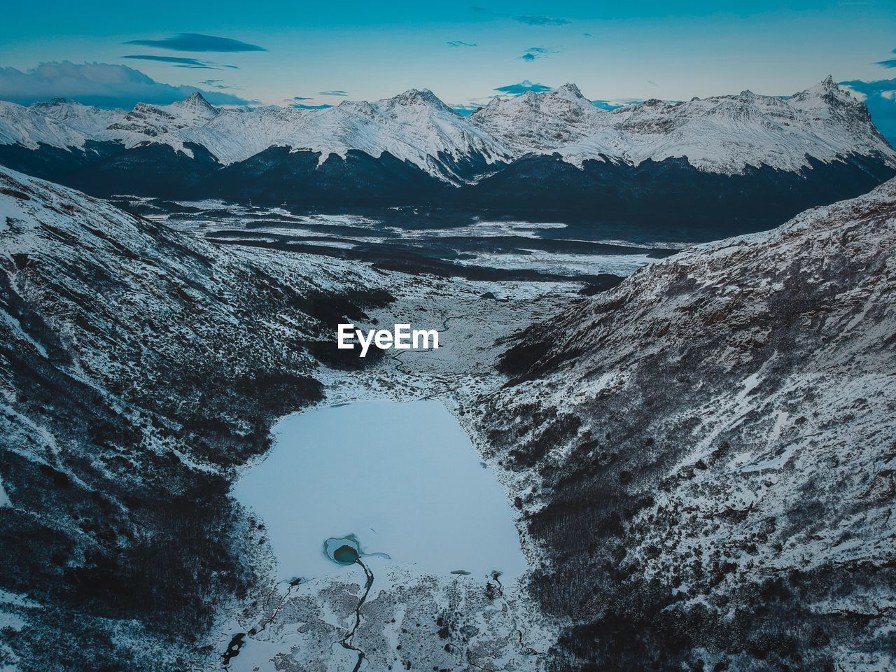 Scenic view of snowcapped mountains during winter