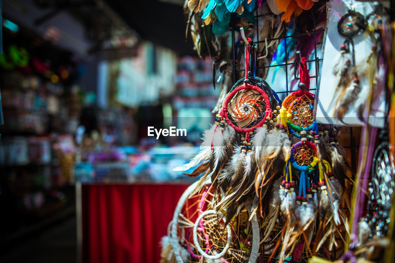Close-up of multi colored dreamcatchers for sale in market