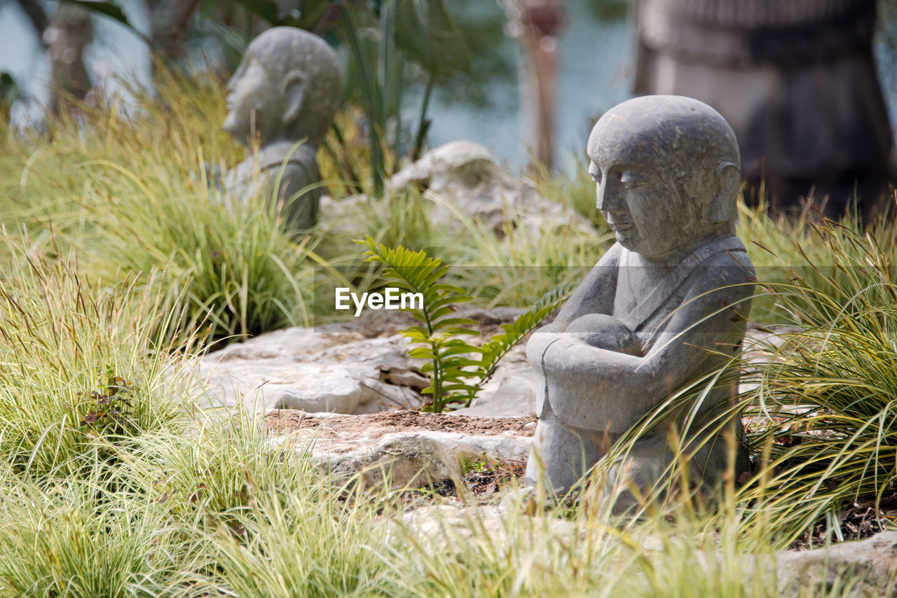 STATUE OF GRASS IN PARK